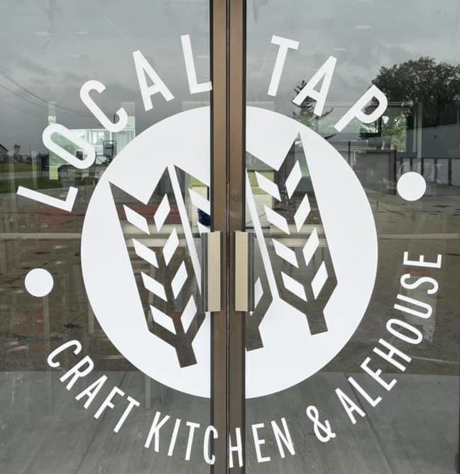 Local Tap decal on double doors
